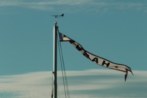 Sarah's name pennant flying from the masthead.